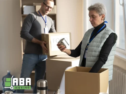 ABA Movers Corporate Relocation Team Members Packing Boxes
