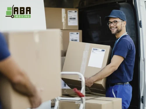Team Member Loading Customer Boxes ABA Movers Team Member Loading Box