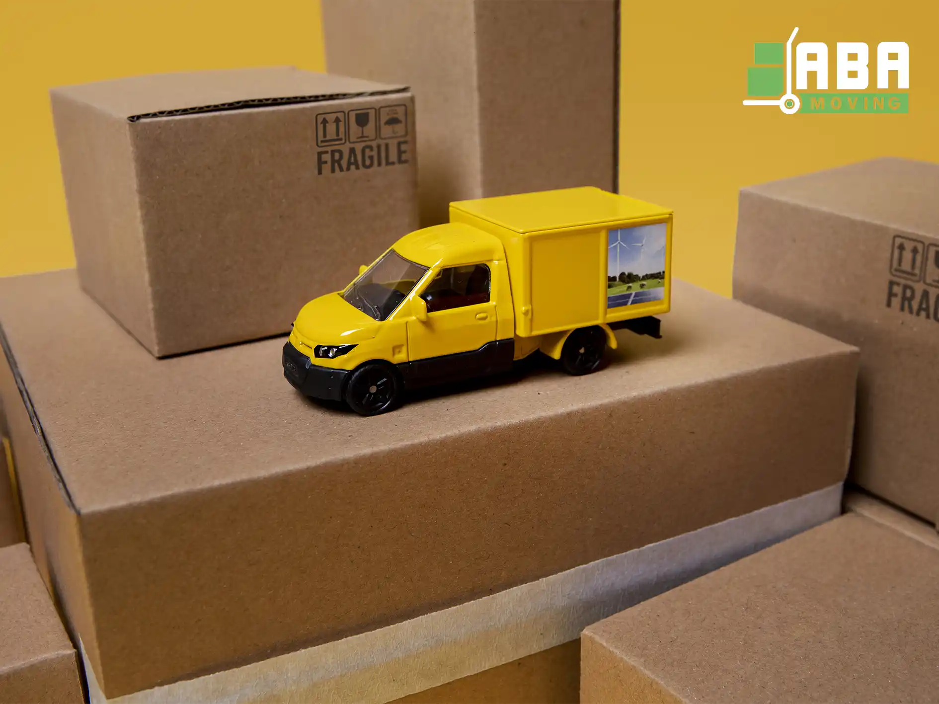 ABA Movers Yellow Truck Relocation on Boxes