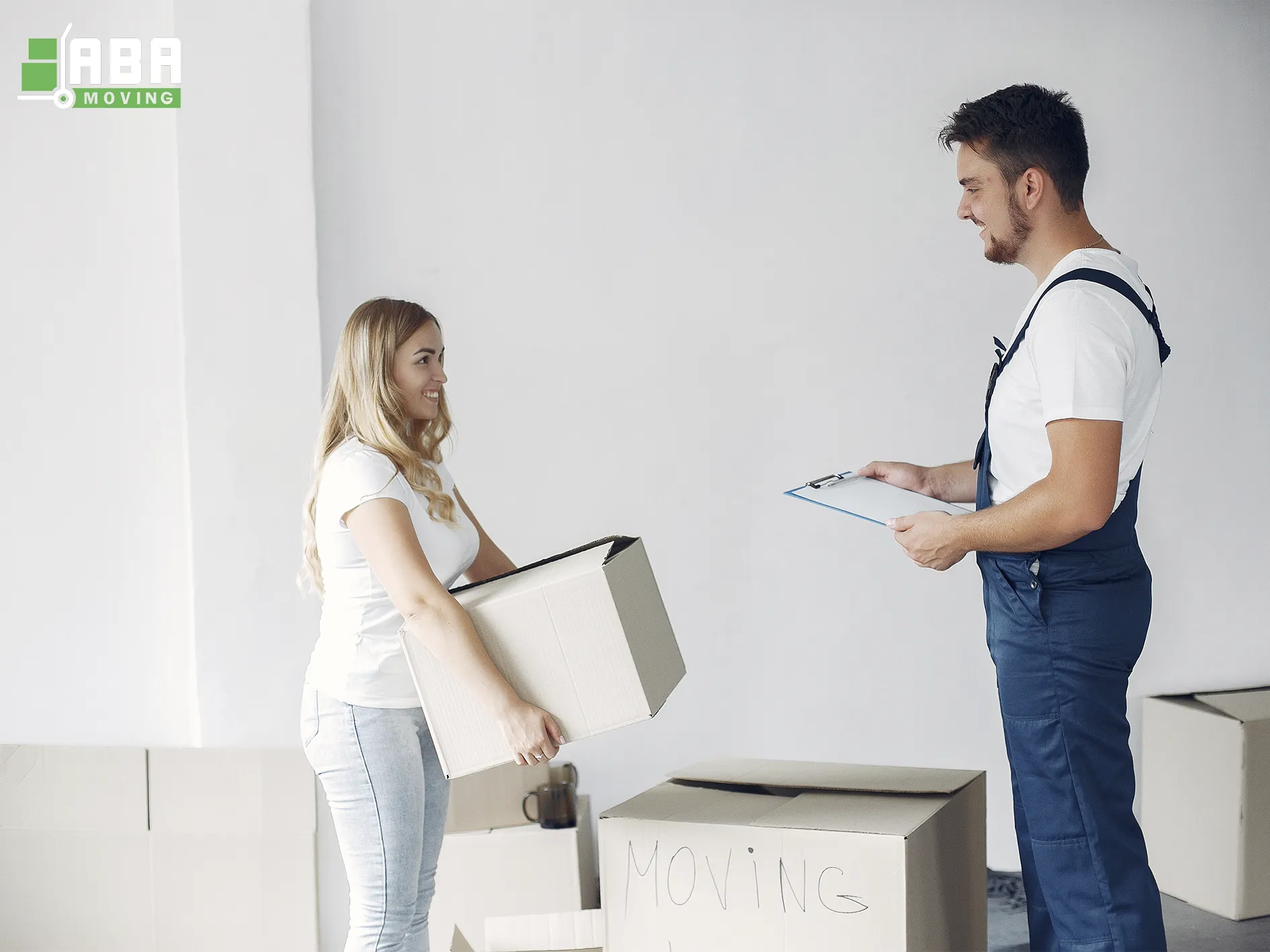 ABA Movers Team Members Checking and Loading Boxes