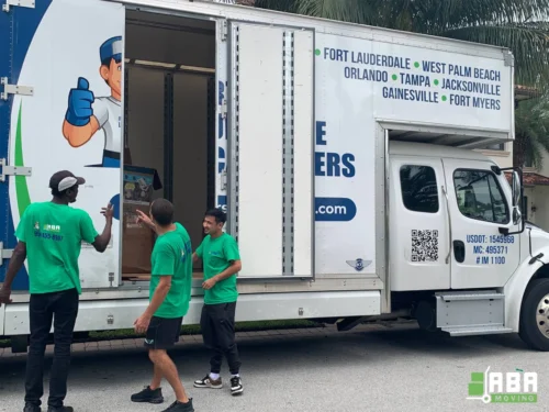 Team Members Ready for Loading Customer Boxes and Furniture ABA Moving Commercial White Truck Team Members Ready for Loading Customer Boxes and Furniture
