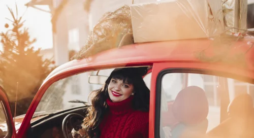 ABA Movers Autumn Moving Customer in Red Car Ready to Move Box on Car Roof