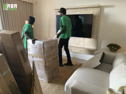 Long-Distance Relocation Team Members Packed Customer Furniture and Boxes
