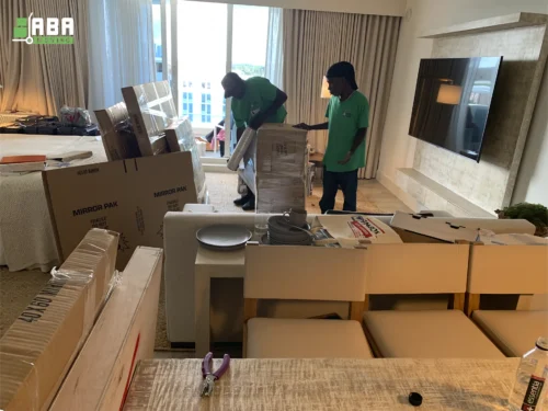 Team Members Packing Customer Furniture and Boxes