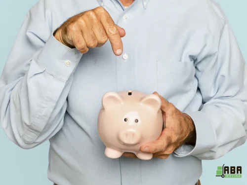 Customer Shows Piggy Bank and How You Can Save Your Money