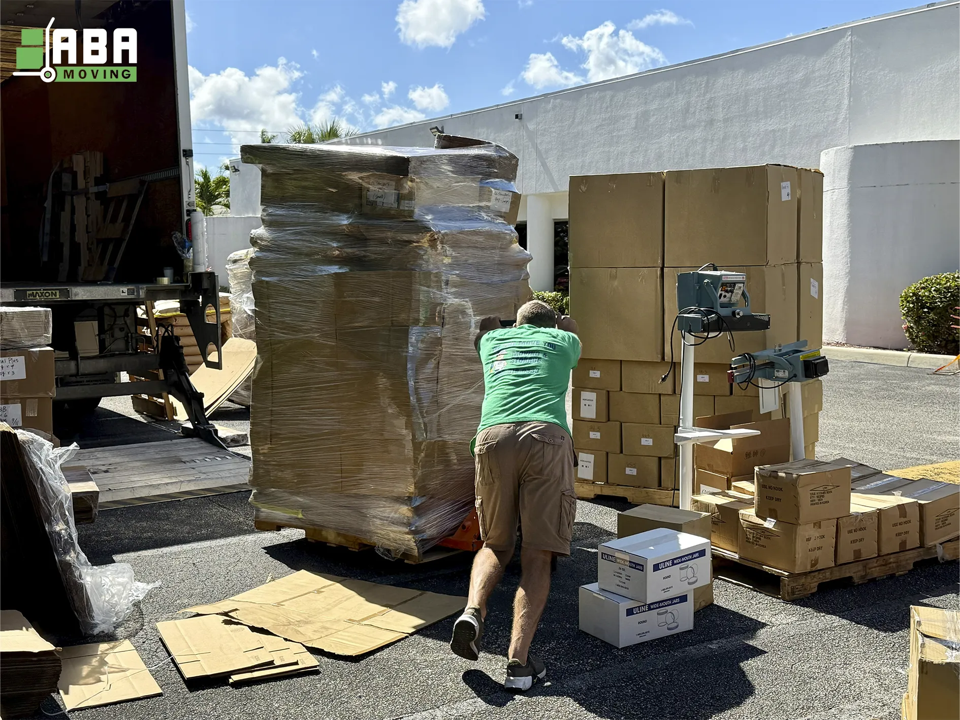Team Member Loading Customer Boxes in Truck